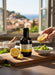 Mein-Weinhandel MANGIA MARC Olio Limone 250ml, aromatisiertes Olivenöl mit Amalfi-Zitronen, 75% Oliven, 25% Zitrone.